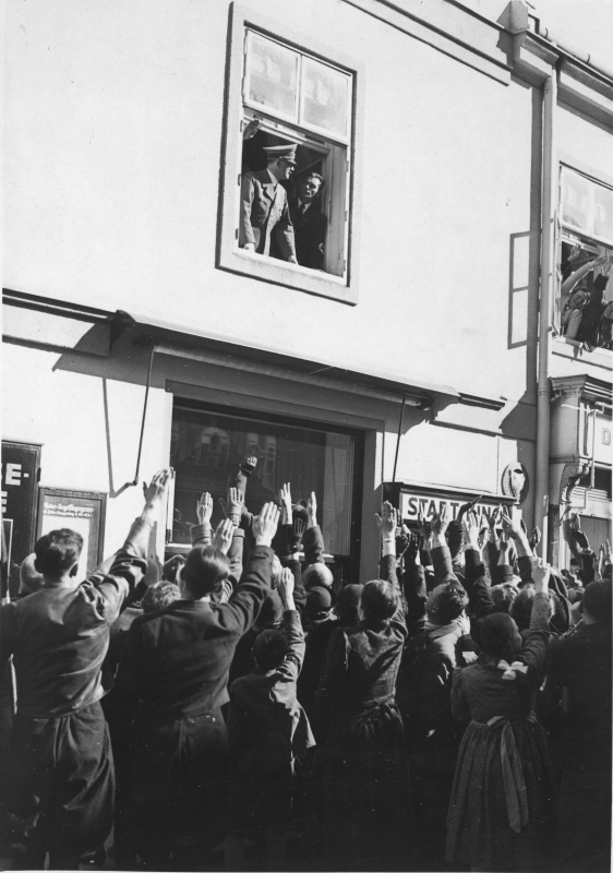Adolf Hitler greets the crowd in Sankt Pölten, Austria